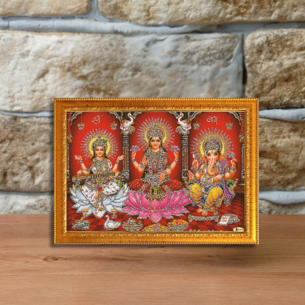 CRAFT QUEST Lakshmi Devi with ganesh ji and saraswati mata Wall Painting Frame Home Decor (Synthetic, Sparkle Finish, Golden, Small Size, 8 X 6 Inch)