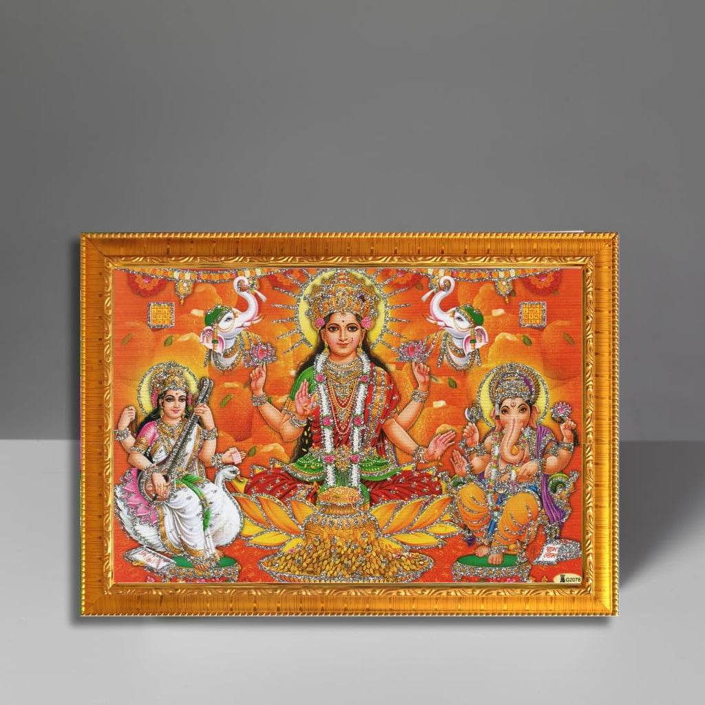 CRAFT QUEST Lakshmi Devi with ganesh ji and saraswati maa Wall Painting Frame Home Decor (Synthetic, Sparkle Finish, Large Size, Golden, 8 X 6 Inch)