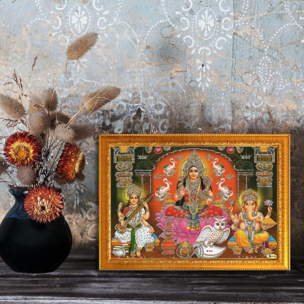 CRAFT QUEST Lakshmi Devi with ganesh ji and saraswati maa Wall Painting Frame Home Decor (Synthetic, Sparkle Finish, Golden, Small Size, 8 X 6 Inch)